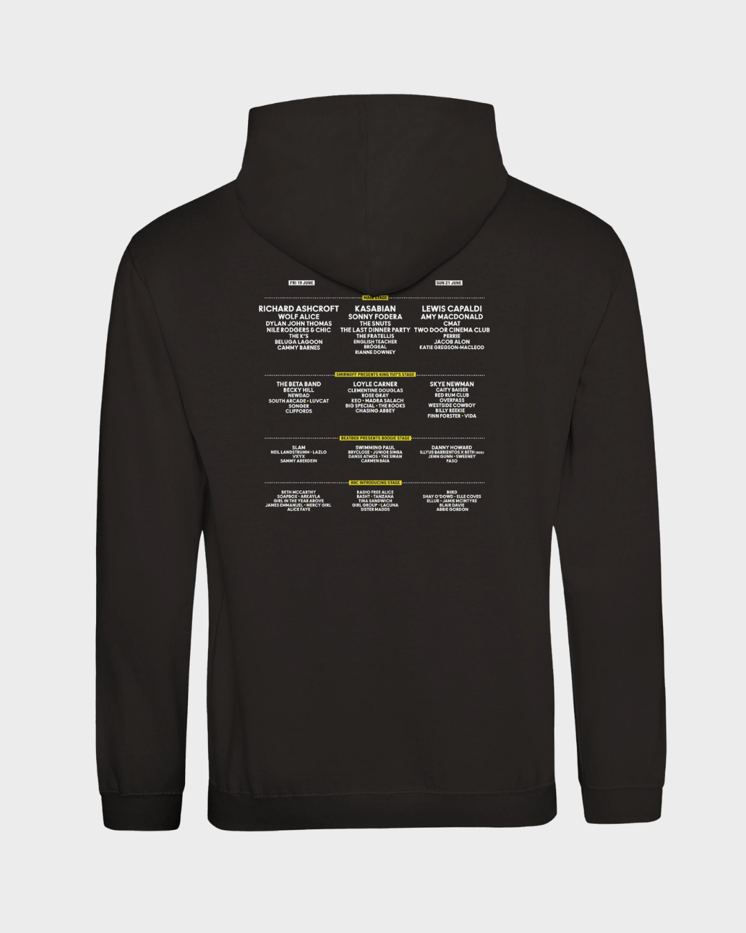 The TRNSMT Festival 2026 Line-Up Black Hoodie is a made-to-order unisex hoodie with white and yellow text on the back showing artists, dates, and locations in a three-column event schedule.
