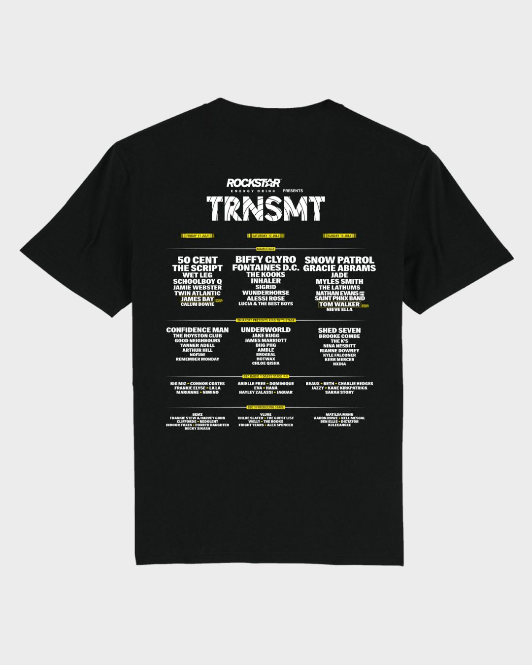 The TRNSMT 2025 Line-Up T-Shirt by 2025 features TRNSMT and Rockstar Energy Presents at the top, with the festivals music artists and bands lineup printed below in white and yellow text.